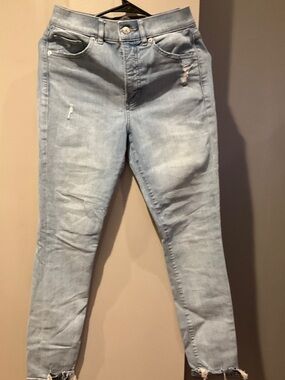 Express Women's Light Blue Skinny Jeans with Distressed Hem